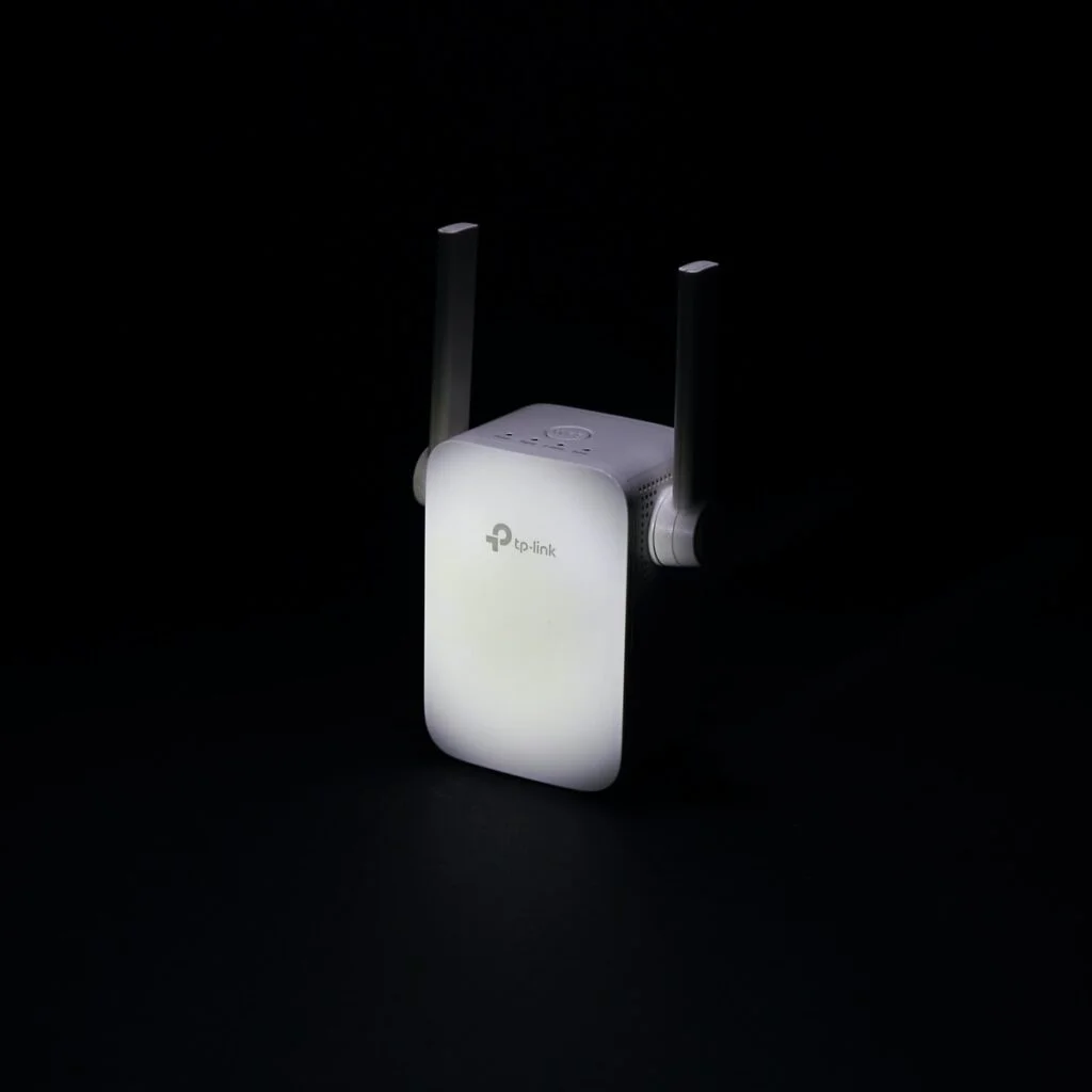 white apple tv remote on white table